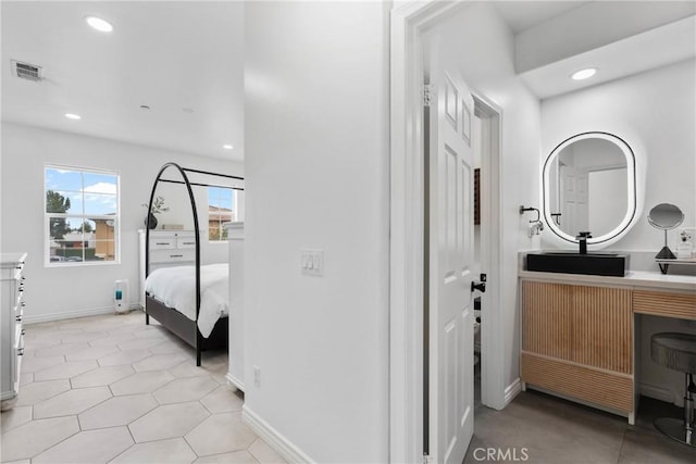 interior space with light tile patterned floors, recessed lighting, and visible vents
