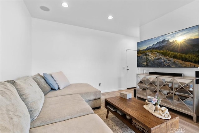 12362 Cottonwood Pl, Santa Fe Springs, CA 90670 - living area featuring wood finished floors and recessed lighting