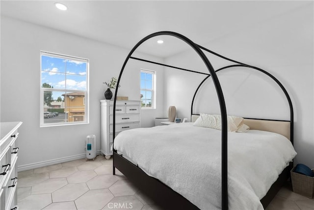 bedroom featuring recessed lighting and baseboards