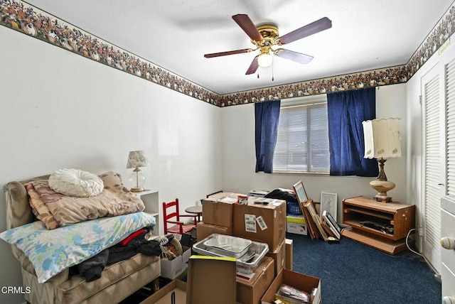 bedroom featuring carpet floors, a ceiling fan, and multiple windows