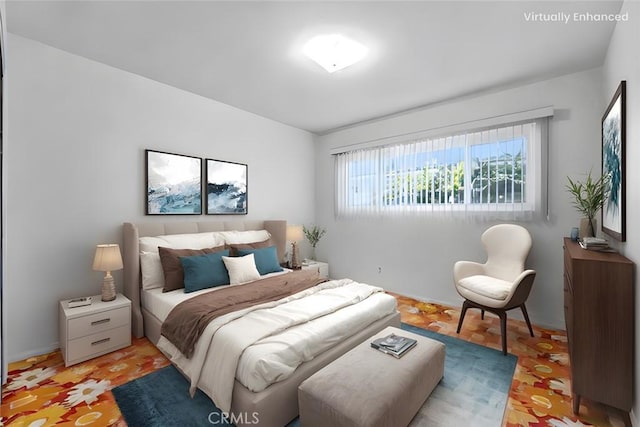 bedroom featuring baseboards