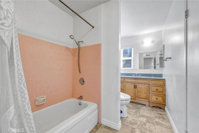 full bathroom featuring shower / bath combination with curtain, baseboards, vanity, and toilet