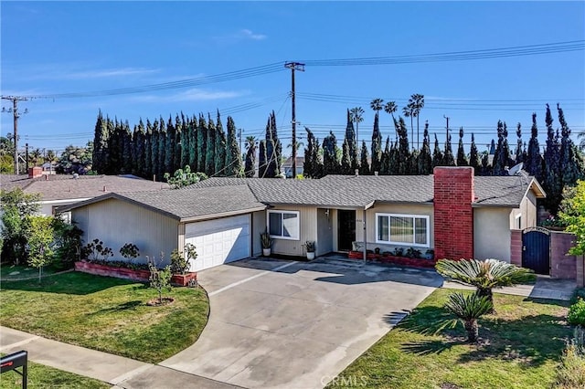 ranch-style house featuring concrete driveway, a chimney, a front yard, and a garage