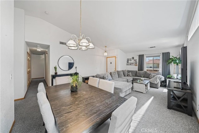 carpeted dining space featuring an inviting chandelier, baseboards, vaulted ceiling, and visible vents