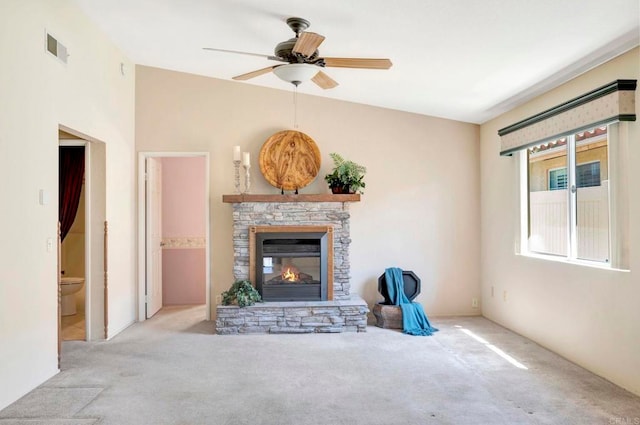 28320 Via Bandita, Menifee, CA 92585 - unfurnished living room featuring a fireplace, visible vents, carpet flooring, and ceiling fan