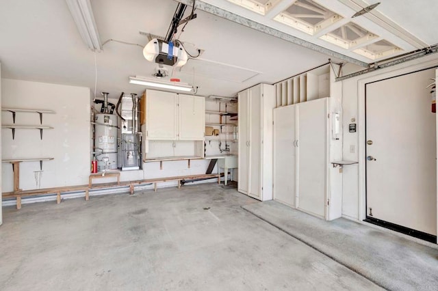 28320 Via Bandita, Menifee, CA 92585 - garage with strapped water heater and a garage door opener