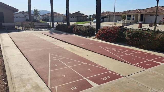 28320 Via Bandita, Menifee, CA 92585 - surrounding community featuring fence, a residential view, and shuffleboard