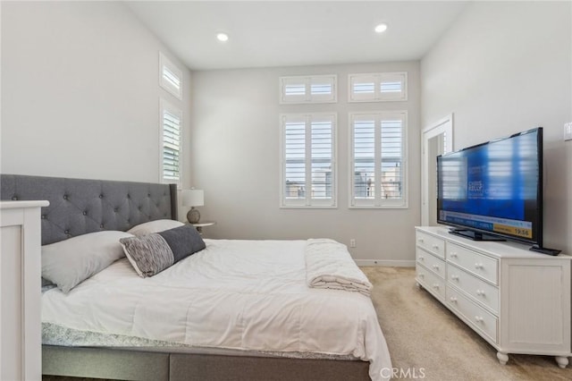 bedroom featuring recessed lighting, baseboards, and light colored carpet