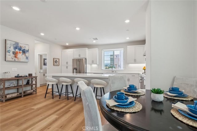 25 Splendor Way, Rancho Mission Viejo, CA 92694 - dining space with light wood-style flooring and recessed lighting