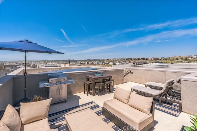 view of patio / terrace with an outdoor living space and grilling area