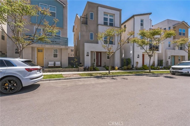 25 Splendor Way, Rancho Mission Viejo, CA 92694 - view of front of property with stucco siding and a residential view