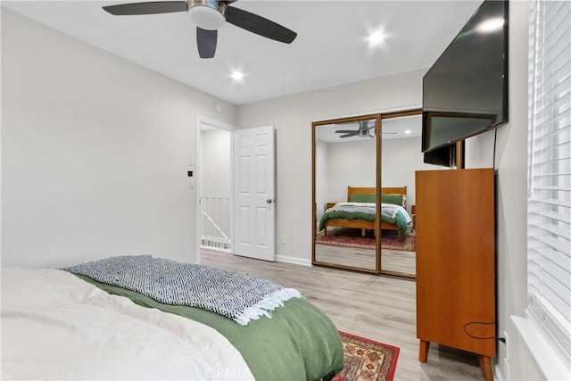 bedroom featuring wood finished floors, recessed lighting, a closet, and a ceiling fan