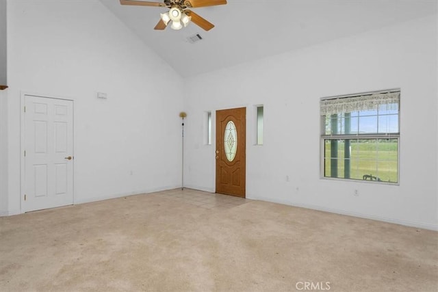 10735 Shasta Blvd, Los Molinos, CA 96055 - foyer entrance with high vaulted ceiling, ceiling fan, light carpet, baseboards, and visible vents