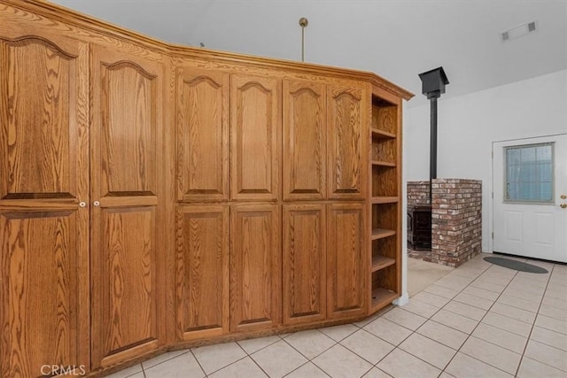 10735 Shasta Blvd, Los Molinos, CA 96055 - interior space featuring a wood stove and visible vents