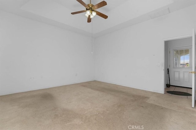 10735 Shasta Blvd, Los Molinos, CA 96055 - unfurnished room with carpet floors, a ceiling fan, a tray ceiling, and visible vents
