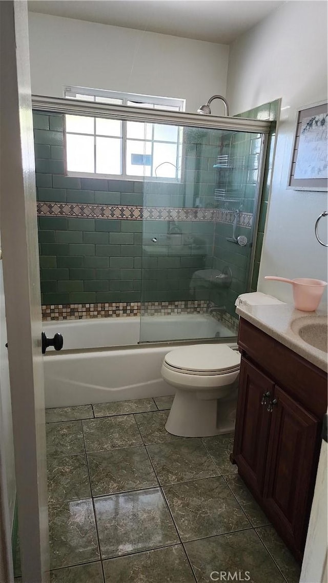 1711 S Washington Ave, Glendora, CA 91740 - bathroom with vanity, combined bath / shower with glass door, and toilet