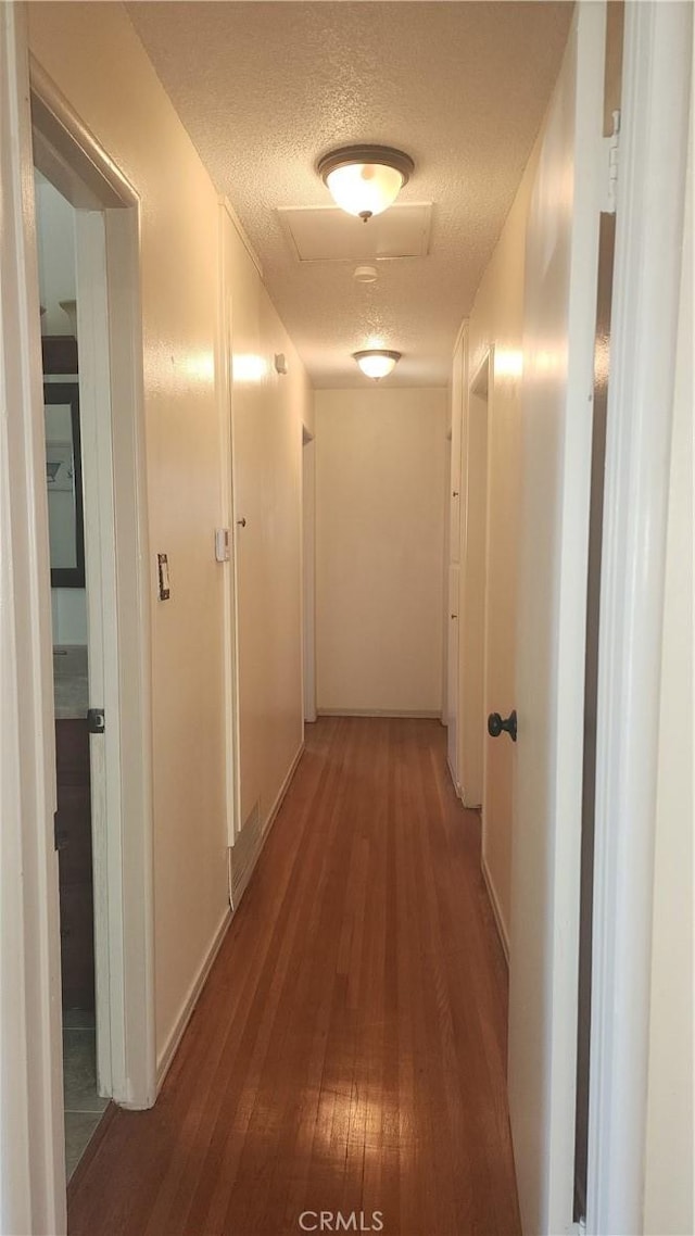 1711 S Washington Ave, Glendora, CA 91740 - corridor with wood-type flooring and a textured ceiling
