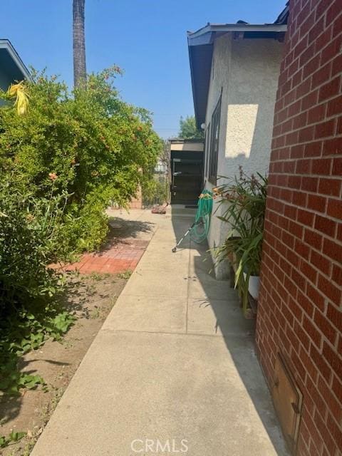 1711 S Washington Ave, Glendora, CA 91740 - view of side of home with brick siding and stucco siding