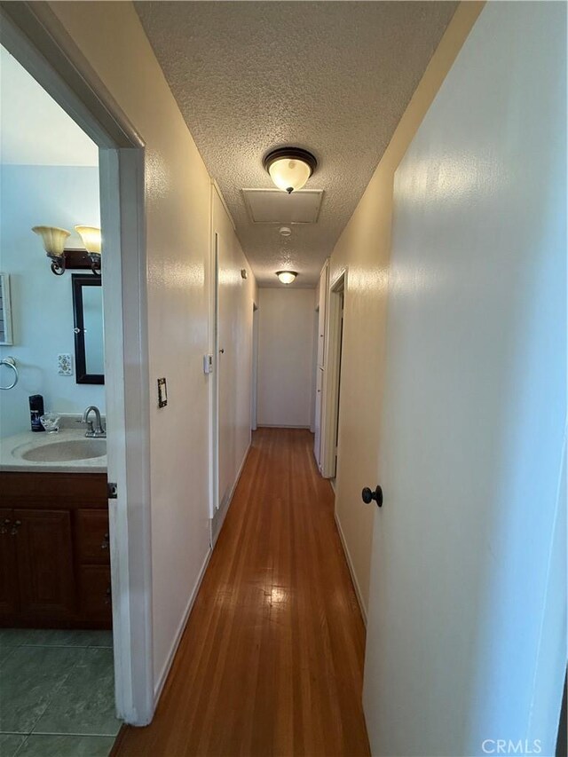 1711 S Washington Ave, Glendora, CA 91740 - hall with a textured ceiling and wood finished floors