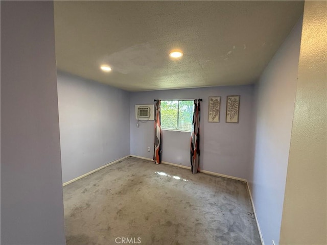 1711 S Washington Ave, Glendora, CA 91740 - carpeted empty room with a wall unit AC and recessed lighting