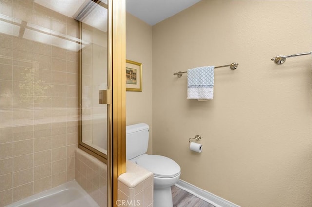 415 S Cedarhaven Way, Anaheim Hills, CA 92807 - full bathroom with baseboards, a stall shower, toilet, and wood finished floors