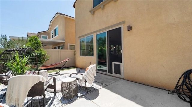 view of patio with fence