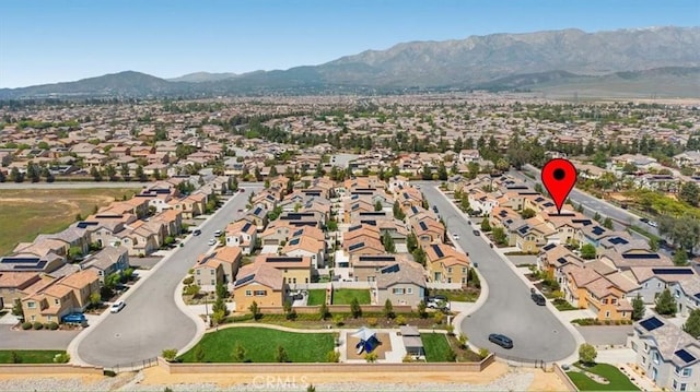 bird's eye view featuring a residential view and a mountain view