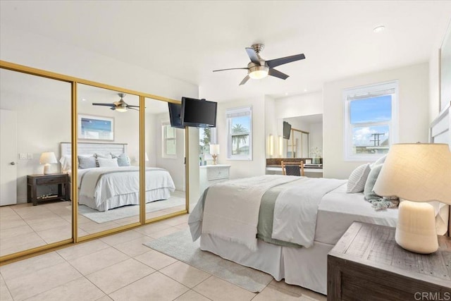 720 San Luis Obispo Pl Unit D, San Diego, CA 92109 - bedroom featuring a ceiling fan, multiple windows, and light tile patterned floors