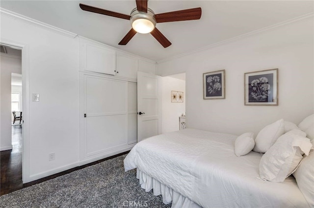 6901 Bertrand Ave, Reseda, CA 91335 - bedroom featuring a ceiling fan, a closet, and crown molding