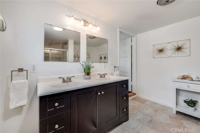 6901 Bertrand Ave, Reseda, CA 91335 - full bath featuring double vanity, an enclosed shower, and tile patterned floors