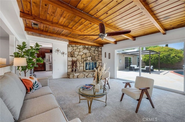 6901 Bertrand Ave, Reseda, CA 91335 - living area with a wood ceiling with exposed beams, ceiling fan, light colored carpet, and a fireplace