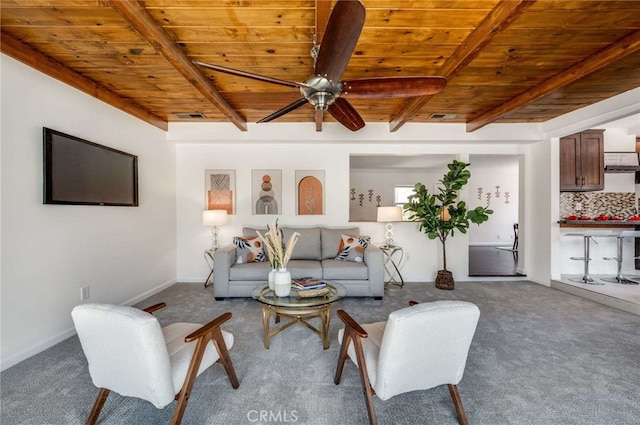 6901 Bertrand Ave, Reseda, CA 91335 - carpeted living room featuring beam ceiling, wooden ceiling, visible vents, and ceiling fan