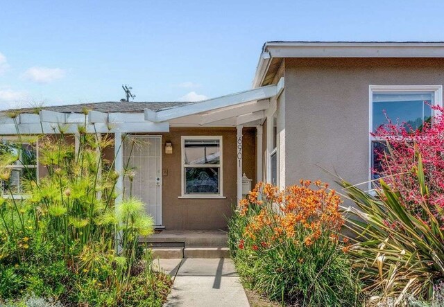 6901 Bertrand Ave, Reseda, CA 91335 - entrance to property featuring stucco siding
