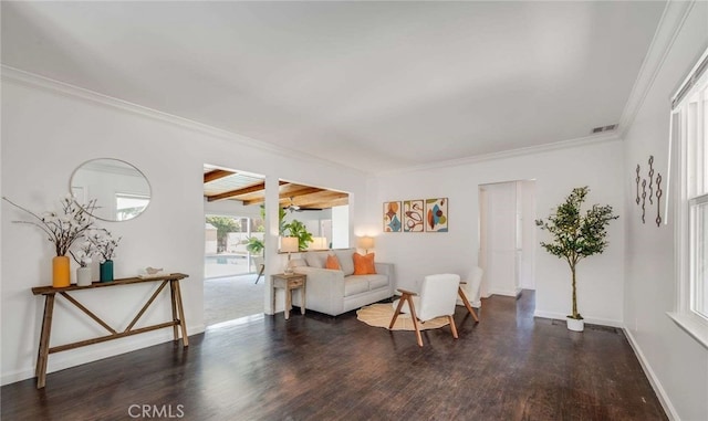 6901 Bertrand Ave, Reseda, CA 91335 - living room featuring wood finished floors, visible vents, crown molding, and baseboards