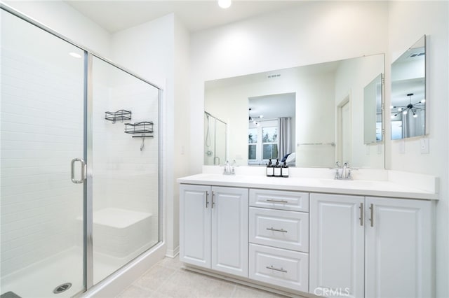 4160 S Bodega Way Unit 2, Ontario, CA 91761 - bathroom with a stall shower, double vanity, a ceiling fan, and tile patterned flooring