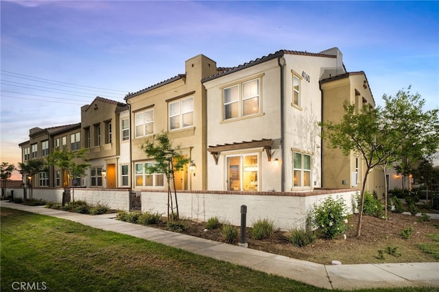 4160 S Bodega Way Unit 2, Ontario, CA 91761 - view of front facade featuring stucco siding and a tile roof