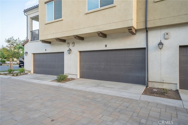 garage with driveway