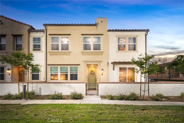 4160 S Bodega Way Unit 2, Ontario, CA 91761 - view of property with stucco siding and a tiled roof