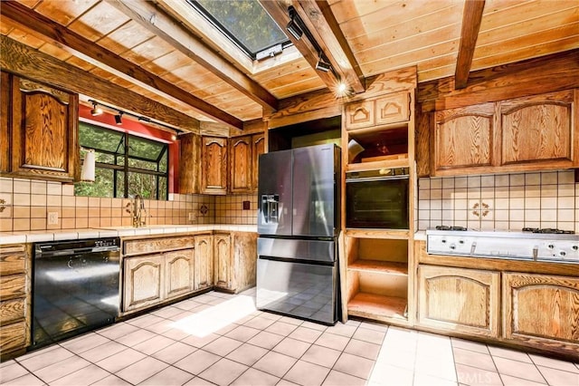 2310 Las Palomas Dr, La Habra Heights, CA 90631 - kitchen featuring a sink, tile countertops, black appliances, wood ceiling, and beamed ceiling