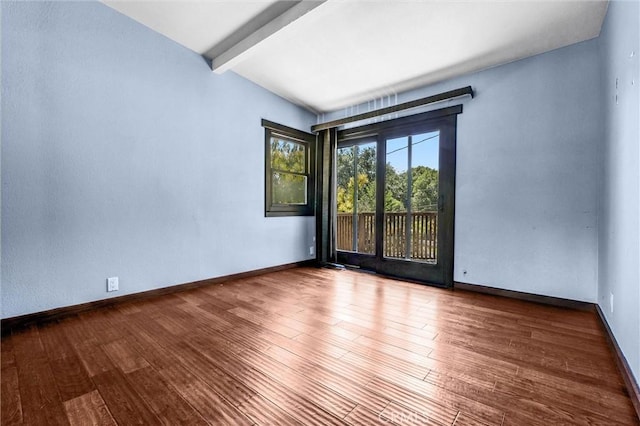 2310 Las Palomas Dr, La Habra Heights, CA 90631 - spare room with baseboards, vaulted ceiling with beams, and wood finished floors