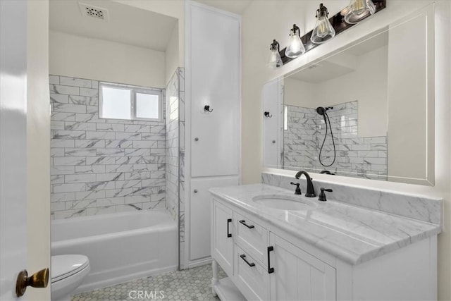 full bathroom featuring vanity, shower / washtub combination, toilet, tile patterned flooring, and visible vents