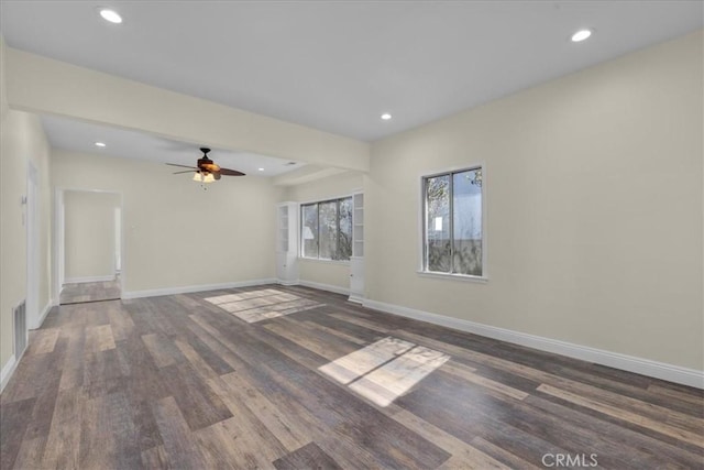 unfurnished living room with recessed lighting, wood finished floors, visible vents, a ceiling fan, and baseboards
