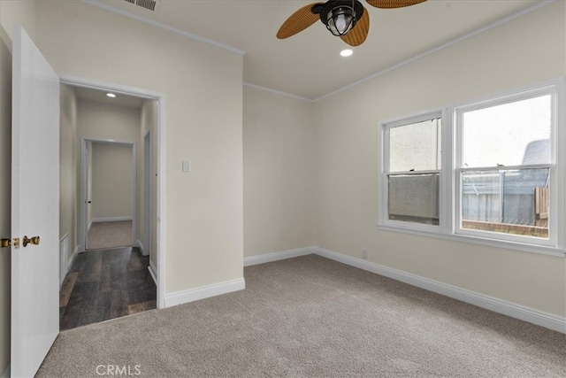 carpeted empty room with ceiling fan, baseboards, crown molding, and recessed lighting