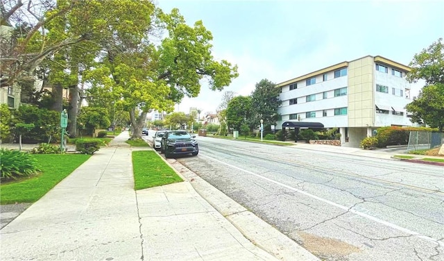 400 S Los Robles Ave Unit 306, Pasadena, CA 91101 - view of asphalt road featuring sidewalks and curbs