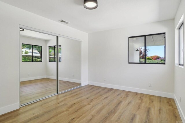 3612 Palomar Dr, Fallbrook, CA 92028 - unfurnished bedroom with wood finished floors and a closet