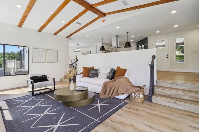 3612 Palomar Dr, Fallbrook, CA 92028 - living room featuring plenty of natural light, wood finished floors, beamed ceiling, recessed lighting, and stairs