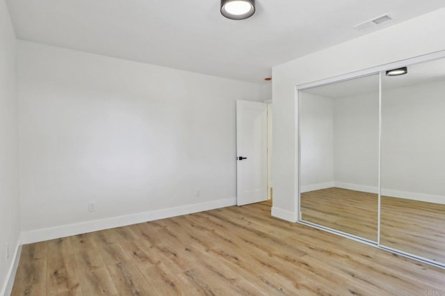 3612 Palomar Dr, Fallbrook, CA 92028 - unfurnished bedroom featuring wood finished floors and a closet