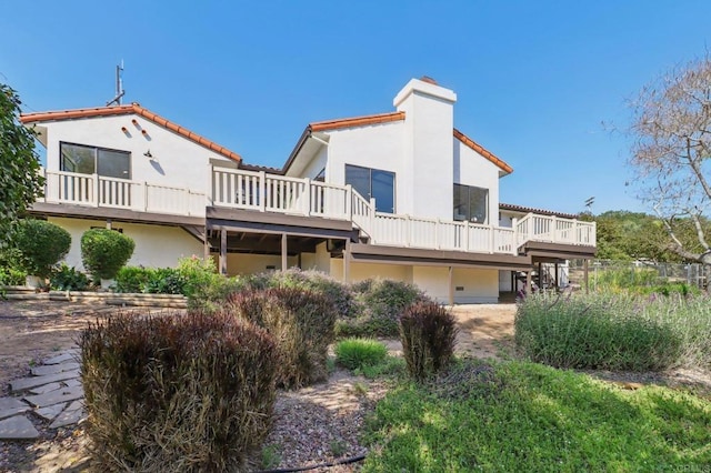 3612 Palomar Dr, Fallbrook, CA 92028 - rear view of property featuring stucco siding, a chimney, and a balcony