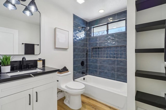 3612 Palomar Dr, Fallbrook, CA 92028 - full bath featuring wood finished floors, vanity, and washtub / shower combination