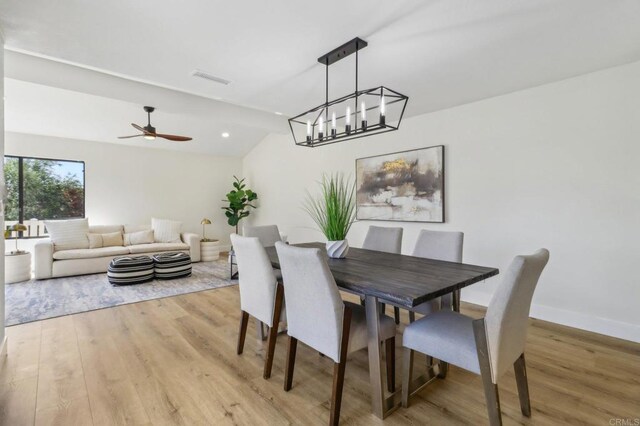 3612 Palomar Dr, Fallbrook, CA 92028 - dining room with wood finished floors, a ceiling fan, lofted ceiling, and a chandelier